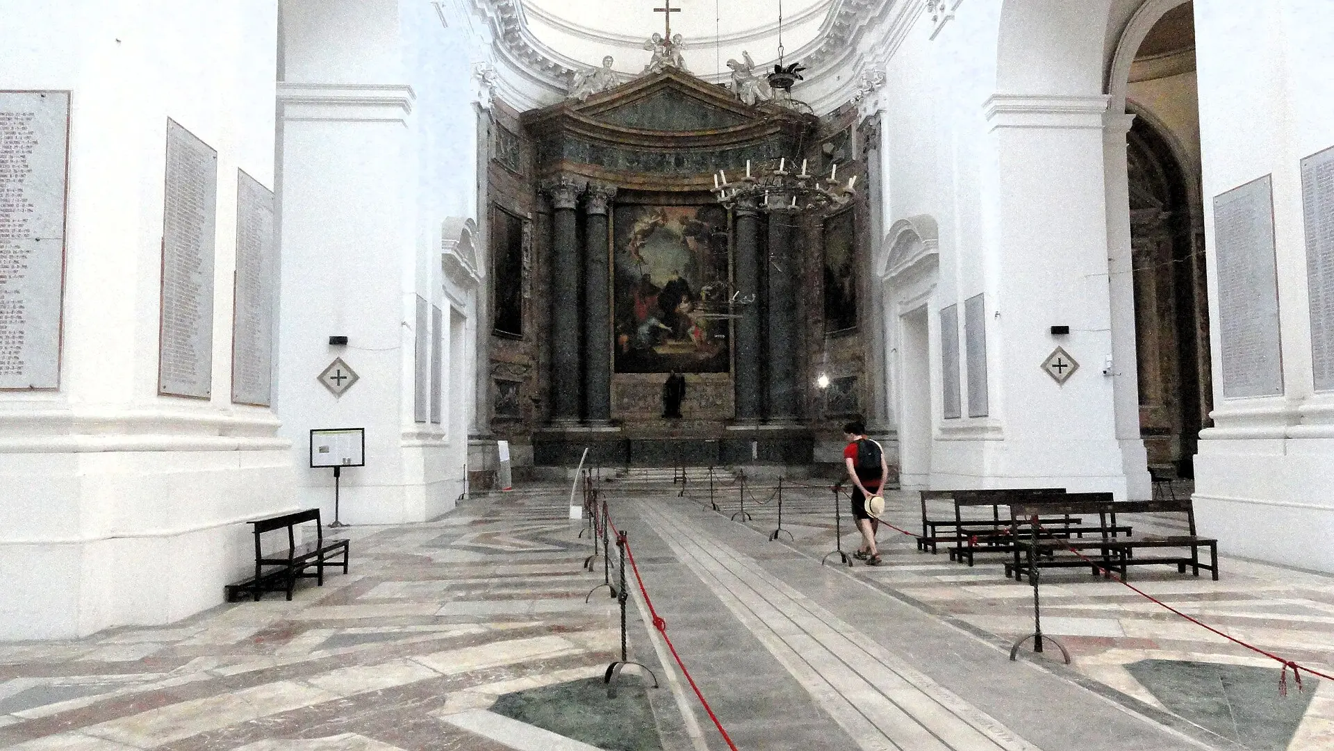 The vast white interior of San Nicolò l’Arena in Catania, with the meridian line inlaid across the floor